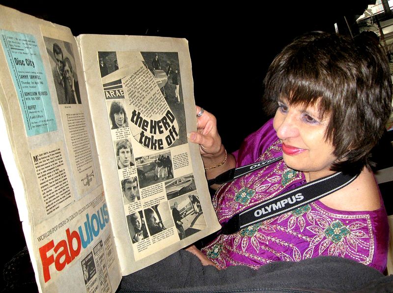 Mary Payne peruses the scrapbook (Photo: Chris Cooper)